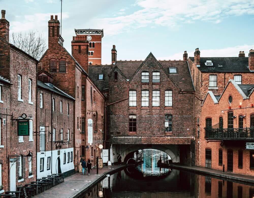 A photo of buildings and a river in Birmingham, UK.
